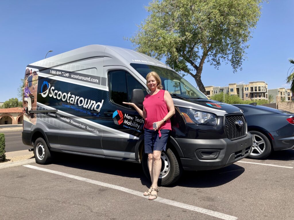 Lady Stood Beside New Tech Mobility Van
