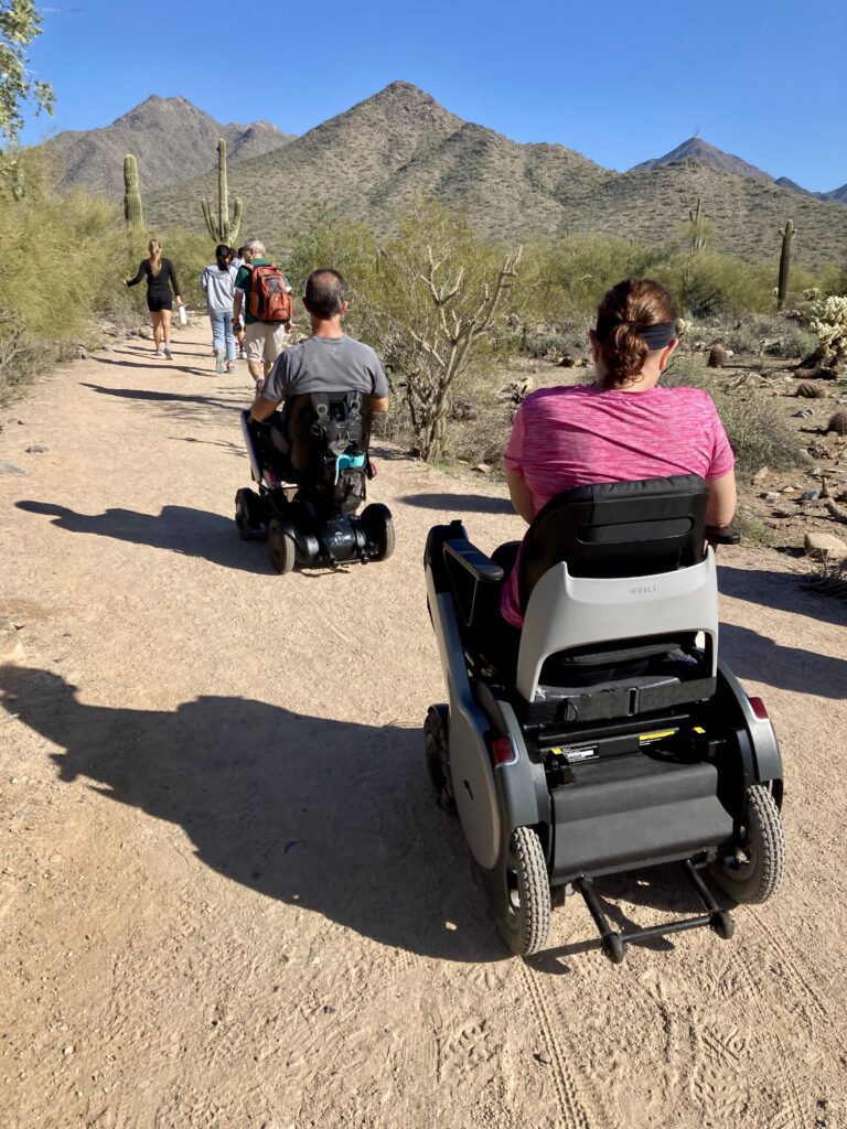 People going on a trek on the wheel chair