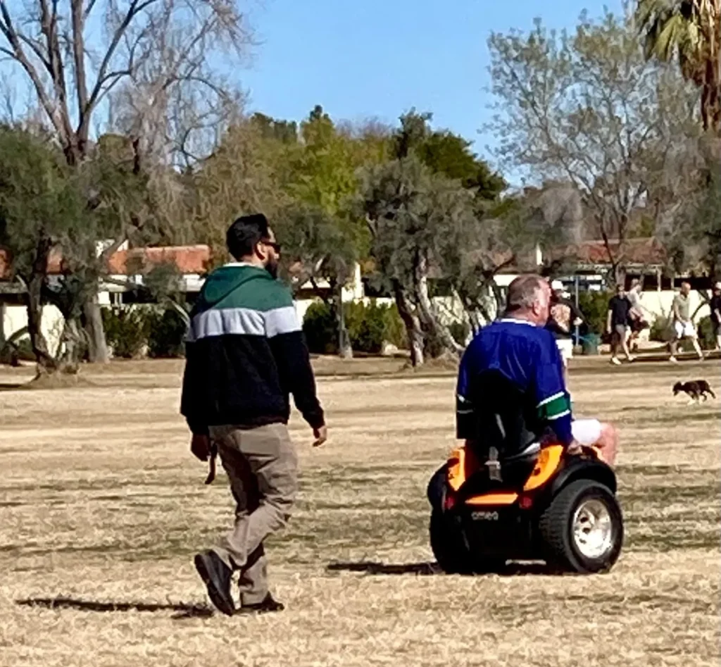 A person in the park using WHILL Mobility Device