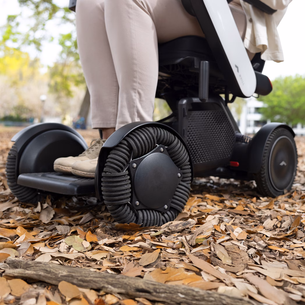 <h3>Confidence on Tough Terrain</h3>Navigate uneven terrain with confidence. Powerful motor, omni-wheels, and four-wheel suspension ensure a safe and stable ride over any surface.
